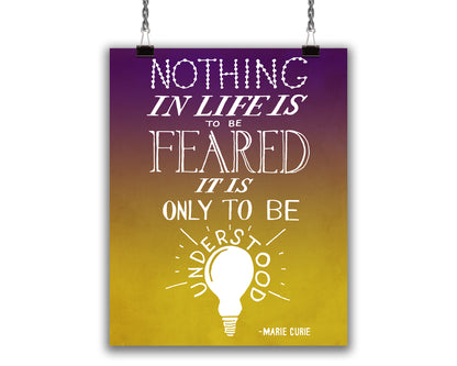 Art Print with hand lettered motivational quote from Marie Curie that reads in white text: Nothing in life is to be feared, it is only to be understood." on a gradient purple and yellow background and illustration of a shining lightbulb